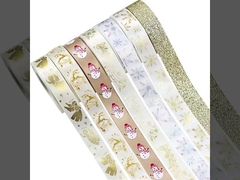 Golden Christmas ribbons, Christmas wreaths, Christmas trees, bows, decorations, DIY gift packaging,