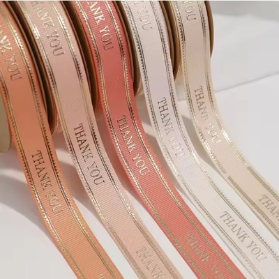 Buy Customized Polyester Gold Foil Branded Ribbon with 3D Logo for Christmas and Birthday online manufacture