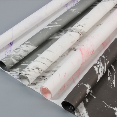 Buy The manufacturer wholesales Valentine's Day white marble-patterned flower bouquets, wrapping paper gifts, and DIY packaging gifts for flower shops online manufacture