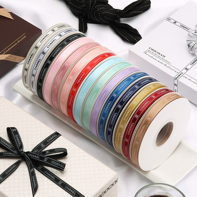 Good price 1cm Small Fragrant Printed Polyester Ribbon Customized Logo Flower Packaging Ribbon Color Ribbon Birthday Cake Box Strap online