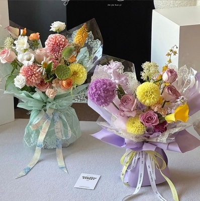 Good price Flower Love, People's Day, small lace, cellophane, lace border, waterbag, flower paper, flower shop, popular bouquet packaging material online