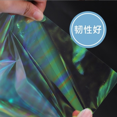 Good price Wholesale waterproof rainbow film, transparent glass paper, flower paper, laser paper, flower bouquet packaging paper materials online
