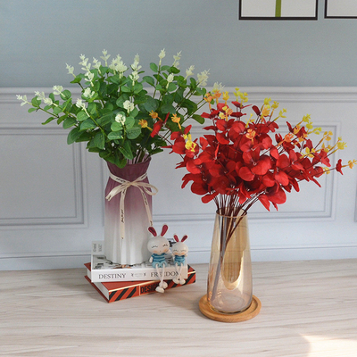 Good price Simulated eucalyptus wholesale wedding decoration flower arrangement outdoor fake flower 16 fork eucalyptus leaf hand-held flower cake with flowers online