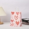 Red 80gsm Kraft Paper Gift Bags Love Heart Printed Paper Goodie Bags With Handles